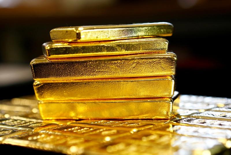 Gold prices fall on inflation data, rate cut expectations